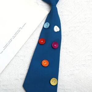 Blue Tie with Colorful Button Accents